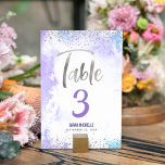 Bat Mitzvah Purple Watercolor Silver Glitter Girly Table Number<br><div class="desc">No Bat Mitzvah party is complete without personalized table number cards. Let your favorite Bat Mitzvah be proud, rejoice and celebrate her milestone at her perfectly coordinated party. Stunning, modern, sparkly silver faux foil handwritten script and tiny dots overlay a light purple watercolor background. Personalize the custom text with the...</div>