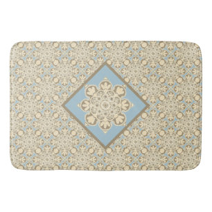Bath mat with cream medallions on blue