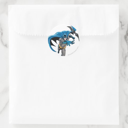 Batman throws batarang classic round sticker Zazzle