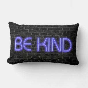 BE KIND text in neon lights on brick Lumbar Pillow