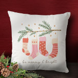 Be Merry and Bright Red & White Christmas Holiday Throw Pillow<br><div class="desc">Add a festive and cheerful touch to your holiday home decor with this adorable seasonal throw pillow. Pillow has red and pink stockings hanging on a pine tree branch with the text be merry and bright. Makes a great addition to your family home holiday decorations and also makes a great...</div>
