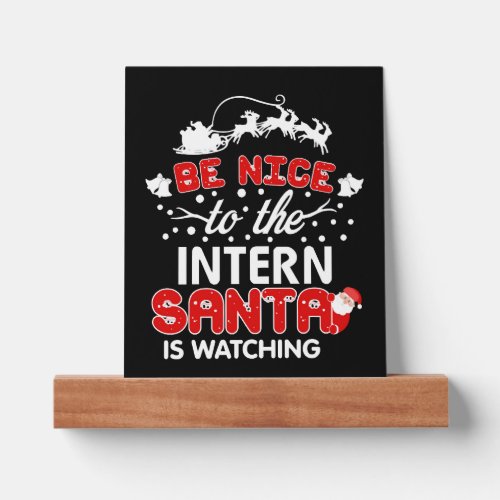 Be Nice To The Intern Santa Is Watching T_Shirt Picture Ledge