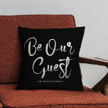 Be Our guest Custom Text Family Modern Black Throw Pillow<br><div class="desc">Modern trendy script calligraphy reading "Be our guest" on this elegant back and ivory throw pillow,  perfect to welcome guests to your home,  vacation rental,  or bed and breakfast.</div>