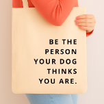 Be the Person your Dog thinks you are Dog Mom Tote Bag<br><div class="desc">Spread kindness and positivity with the playful “Be the Person Your Dog Thinks You Are” design. A sweet reminder of unconditional love and loyalty,  this modern typographic piece is perfect for dog mums,  dog dads,  and anyone who adores their four-legged best friend. Joyful,  uplifting,  and full of heart.</div>
