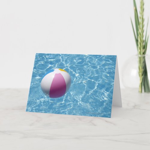 Beach ball in swimming pool card