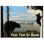 Beach Bears Cutout<br><div class="desc">Two Native Americans paddle their canoe across a lake, just offshore, on a foggy morning. A black bear sow is none too pleased and has sent her cub up a nearby birch tree for safety. Add your own text. The American black bear, Ursus americanus, is the smallest of the three...</div>