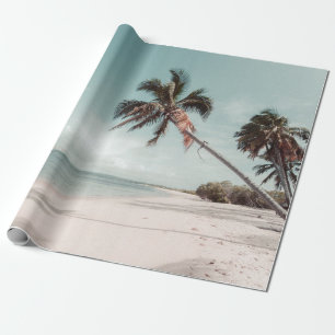 Beach beside coconut palm tree wrapping paper