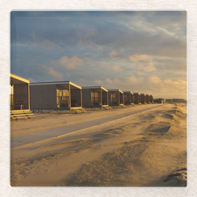 Beach cabins at sunset at the dutch coast glass coaster (Front)