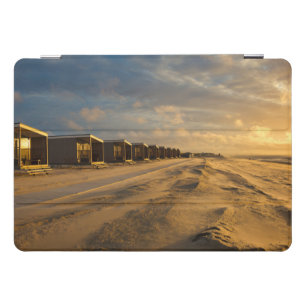 Beach cabins at sunset at the dutch coast iPad pro cover
