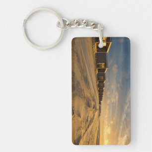 Beach cabins at sunset at the dutch coast keychain