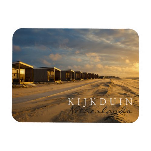 Beach cabins at sunset at the dutch coast magnet