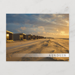 Beach cabins at sunset at the dutch coast postcard