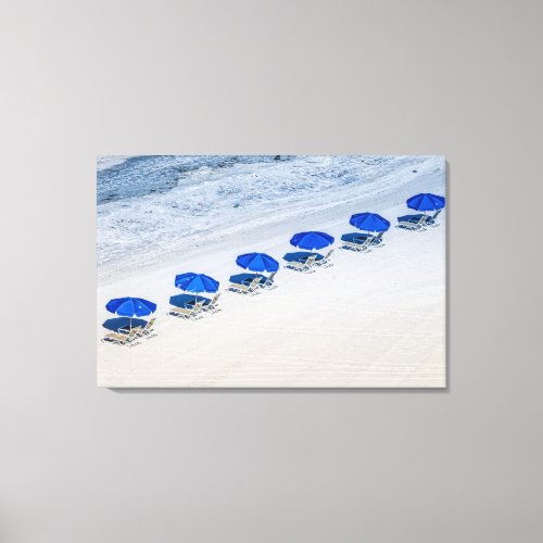 Beach Chairs with Blue Umbrellas on Madeira Beach Canvas Print