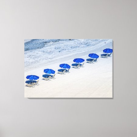 Beach Chairs With Blue Umbrellas On Madeira Beach Canvas Print