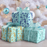 Beach Christmas Glitter Seahorse Pattern Aqua Blue Wrapping Paper Sheets<br><div class="desc">This set of 3 coastal themed wrapping paper sheets features a festive ocean beach Christmas pattern of seahorses, seashells, and holly sprigs, in gold, aqua, and navy glitter, on a light aqua blue background. If you would like this design on more products or other colorways, or for other design-related inquiries,...</div>