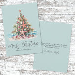 Beach Christmas Holiday Card<br><div class="desc">Celebrate the holidays with a bit of surf and sand with this shell and starfish Christmas tree holiday card. The design features a teal blue background on both sides, with gray and black fonts for a clean, coastal-inspired look. The Christmas tree is made of seashells and starfish, topped with a...</div>