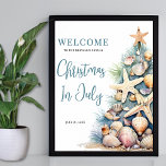 Beach Christmas Is July Welcome Sign<br><div class="desc">Welcome guests to your holiday gathering with this festive and beachy Christmas in July welcome sign. The design features a large Christmas tree on the right made of beach shells, starfish, and coral, bringing a fun coastal touch to your celebration. The tree's soft green, tan, and coral-red details pair perfectly...</div>