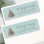 Beach Christmas Return Address Label<br><div class="desc">Tropical Beach Christmas Tree Return Address Label. This festive label features a charming seashell and starfish Christmas tree, topped with a starfish and set on a sandy base with hints of teal blue ocean waves. The beachy artwork appears on the left, while your name and address are displayed on the...</div>