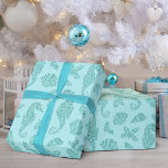 Beach Christmas Seahorse Pattern Aqua Glitter  Wrapping Paper<br><div class="desc">This beautiful aqua blue coastal Christmas wrapping paper features a pattern of glitter seahorses,  seashells,  and holly sprigs for a festive beach holiday design.</div>