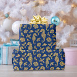Beach Christmas Seahorse Pattern Gold Navy Blue  Wrapping Paper<br><div class="desc">This beautiful coastal Christmas wrapping paper features a nautical ocean pattern of gold glitter seahorses, seashells, and holly sprigs on a navy blue background, for a festive beach holiday design. If you would like this design on more products or other colorways, or for other design-related inquiries, please contact me through...</div>