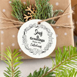 Beach Christmas Seas and Greetings Gift Stamp<br><div class="desc">Add a touch of coastal charm to your holiday greetings with our Seas & Greetings Seashell Rubber Stamp! This delightful stamp features a ring of beautifully detailed seashells encircling the text "Seas & Greetings from the, " leaving plenty of space for you to personalize it with your family name. It's...</div>