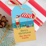 Beach Christmas Summer Santa Claus Custom Party Gift Tags<br><div class="desc">This cute custom Christmas in July party gift tag makes perfect summer party decor for a beach bash or pool gathering. Make it a fun north pole themed extravaganza with Santa Claus in his swimming trunks next to a red and white striped beach umbrella and gifts. I've never seen Mr....</div>