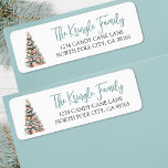 Beach Christmas Tree Return Address Label<br><div class="desc">This festive return address label features a charming Christmas tree made of stacked seashells in soft hues of blue, white, and pink, topped with a small starfish for a whimsical coastal touch. The seashell tree rests on a sandy base, capturing the relaxed beauty of the beach at Christmastime. On the...</div>
