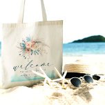 Beach Destination Wedding Tote Bag<br><div class="desc">Make a stylish statement with this Beach Destination Wedding Tote Bag, perfect for your coastal celebration. Featuring a serene watercolor design in blue, teal, turquoise, and peach hues, along with delicate floral accents, it offers a chic and boho vibe. With the word "Welcome" in elegant script, this tote bag is...</div>