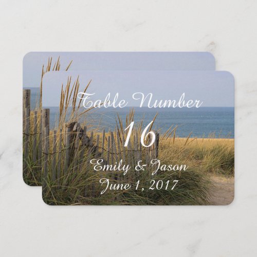 Beach fence in the sand dunes invitation