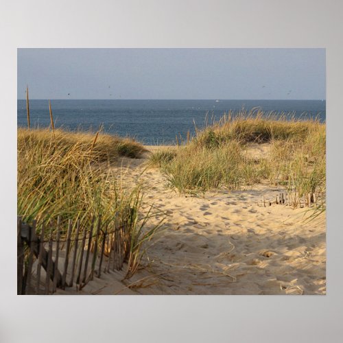 Beach fence in the sand dunes poster