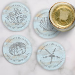 Beach House Vintage Sea Shells Coral Custom Coaster Set<br><div class="desc">Super cute set of coasters featuring vintage style sea graphics - a shell, sea urchin, starfish, and coral all set against a weathered blue wood background. Add two lines of custom text to personalize. Perfect for a beach house, vacation rental, nautical seaside cottage, beach wedding and more - great as...</div>