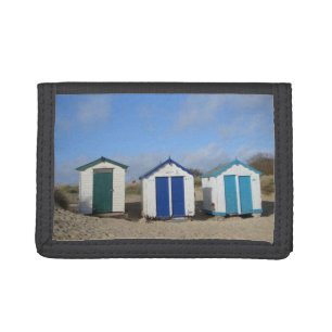 Beach huts and blue skies english seaside photo tri-fold wallet