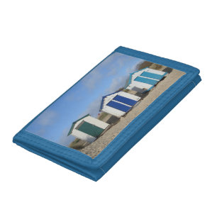 Beach huts and blue skies english seaside trifold wallet