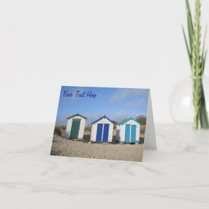 Beach huts blue skies english seaside photographic card