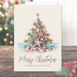 Beach Merry Christmas Tree Holiday Card<br><div class="desc">Happy Holidays! Share some coastal cheer with this folded holiday card featuring a festive Christmas tree made of seashells and topped with a starfish. Both the front and back have an off-white or cream background, giving the design a soft, timeless look. All fonts are shown in gray for a simple,...</div>