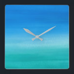 Beach Ocean Blue Green No Numbers Square Wall Clock<br><div class="desc">This design features a beachy watercolor ocean blue/green background with no numbers to distract from the view! Click the customize button for options for adding text! Variations of this design, additional colors, as well as coordinating products are available in our shop, zazzle.com/store/doodlelulu. Contact us if you need this design applied...</div>