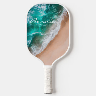 Beach ocean water on seashore sand tropical summer pickleball paddle