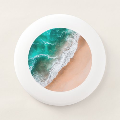 Beach ocean water on seashore sand tropical summer Wham_O frisbee