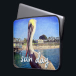 Beach Pier Pelican Bird Photo Sun Day Quote Script Laptop Sleeve<br><div class="desc">This happy pelican perched on a railing overlooking a California beach screams “vacation ready”. Drift back to the warm ocean breezes whenever you use this colorful photography neoprene laptop sleeve. This laptop sleeve comes in three sizes: 15", 13", and 10”. Makes a great gift for someone special! You can easily...</div>