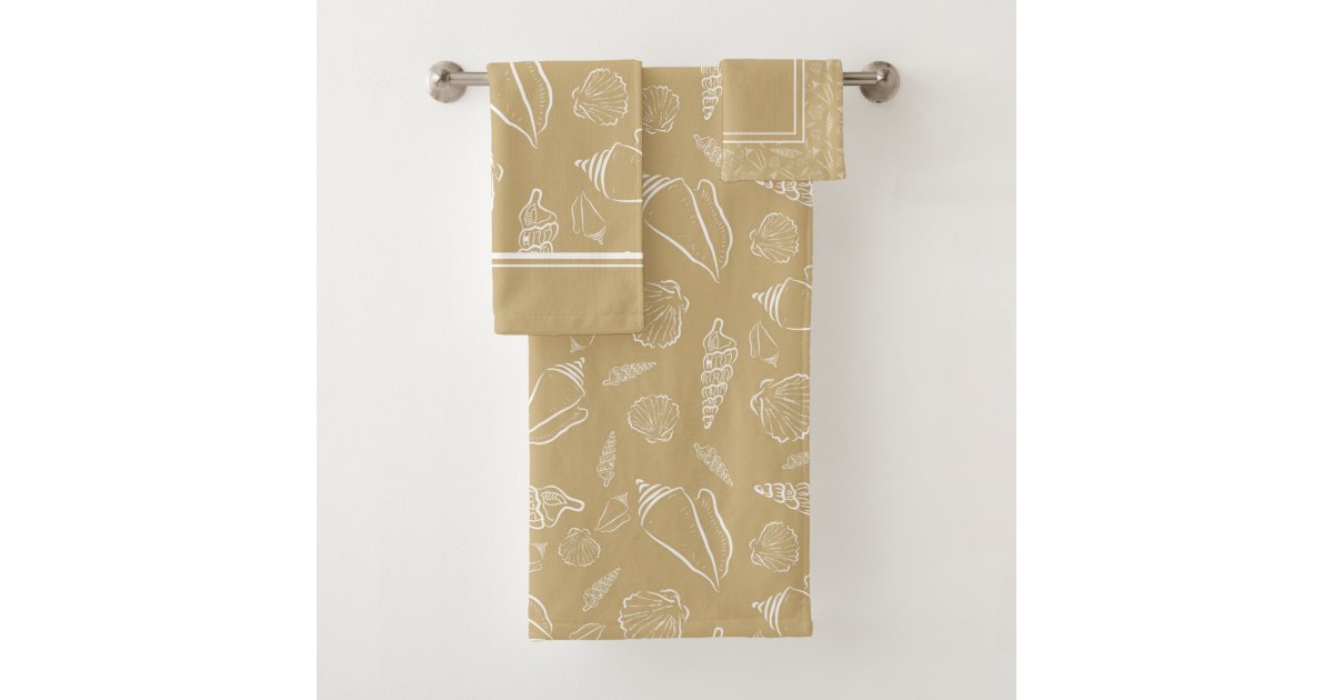 tan and white beach towels