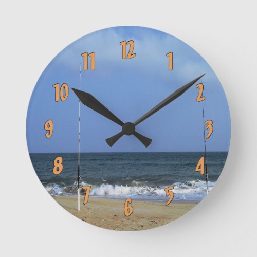 Beach Scene With Fishing Poles Round Clock