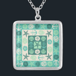 Beach Seashells Nautical Modern Teal Green Silver Plated Necklace<br><div class="desc">This modern, nautical beach necklace is done in a quilted block pattern with alternating green and sand-beige squares. This pretty beach-themed decorative, stylized design includes shells, starfish, anchors and sand dollars in light beige and green shades ranging from teal to seafoam. This ocean-inspired design has a retro / vintage, deco...</div>