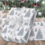 Beach Shell Christmas Tree Pattern Wrapping Paper<br><div class="desc">Celebrate the holidays with a soft coastal twist using this wrapping paper featuring a watercolor Christmas tree in sage green. The tree is decorated with blue and white seashells and is topped with a white starfish, creating an overall blue and white color palette. The background is currently white, but you...</div>