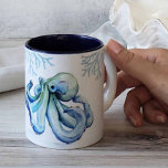 Beach Themed Coffee Mugs Blue Octopus<br><div class="desc">Add coastal style to your beach home. These beach-themed coffee mugs features blue octopus with sea coral art. The words "Seas the moment" are set in hand lettered script typography. To see more ocean-inspired mugs, visit www.zazzle.com/dotellabelle Unique art and design by Victoria Grigaliunas of Do Tell A Belle. Makes great...</div>
