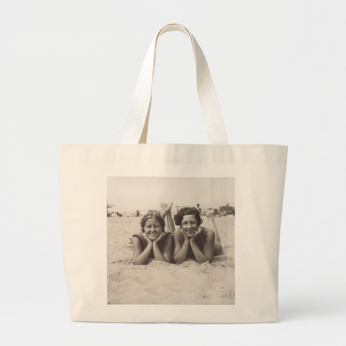 Beach tote with a vintage travel poster tote bags