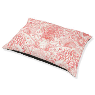Beach treasures in coral red pet bed