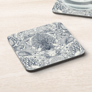 Beach treasures, seashells, crab, corals and seawe beverage coaster