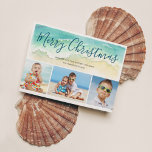 Beach Vacation Merry Christmas Photo Holiday Card<br><div class="desc">Send warm season's greetings with this beach-themed Christmas card. The coastal holiday photo cards features a sea green watercolor wave upon a sandy shore. Script lettering atop the wave reads "Merry Christmas" in a pretty blue-green ocean color. Three photos are placed below the painted wave. To personalize, add your names...</div>