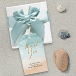 Beach Watercolor Destination Wedding Thank You Gift Tags<br><div class="desc">Destination beach wedding thank you favor tags to personalize. This design features elegant gold calligraphy and watercolor ocean shoreline. This beautiful and inviting theme has a sandy beach background and "thank you" is hand lettered. The template is ready for you to add your personalized thank you message. Versatile design for...</div>