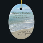 Beach Wedding Hearts in the Sand Elegant Ceramic Ornament<br><div class="desc">Two interlocking beach wedding hearts drawn in the sand makes an elegant tropical ocean coastal nautical theme wedding,  matching set of items. Pretty turquoise water waves crashing on the shore and pastel blue sky.</div>